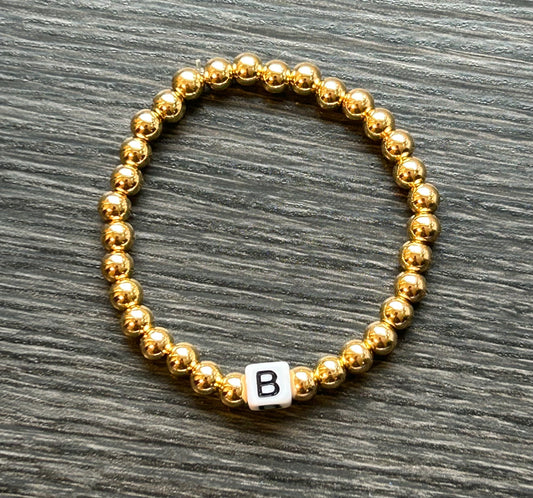 Gold Initial Black Letter